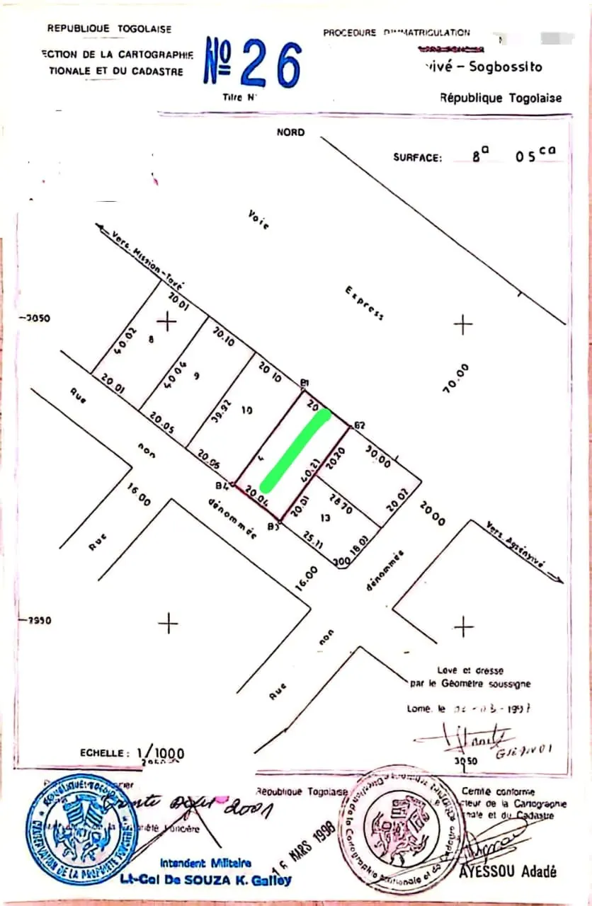 Vente d'un terrain à Sogbossito, 2/3 de lot, bord du goudron – 50 millions FCFA