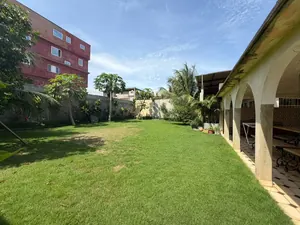 Résidence 4 lots en vente en bordure de goudron à Djidjolé – 450 millions FCFA — photo 7