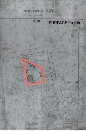 Terrain 986 m² en vente à Nyékonakpoè Lokodonou avec immeuble à rénover – 170 millions FCFA