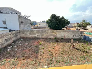 Vente d'un terrain à Nukafu Cerfer / China Mall, demi-lot clôturé – 50 millions FCFA — photo 3