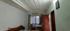 Vente d'une maison à Bè Kpehenou, 8 chambres, 5 boutiques, 453 m², en bordure de route principale – 140 millions FCFA — photo 2
