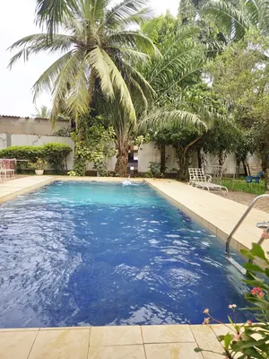 Vente d'une villa à Agoè Cacaveli, meublée avec piscine, 6 chambres sur 2 lots et demi – 350 millions FCFA — photo 18