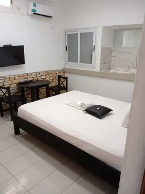 Résidence 17 chambres meublées avec piscine et sky bar en vente à Baguida Devego – Titre foncier – 450 000 000 FCFA — photo 8