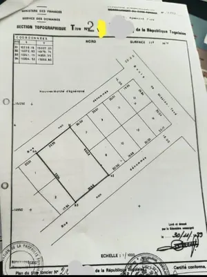 Terrain 4 lots en vente à Agoè Assiyéyé Marché en bordure de goudron – Lomé, Togo