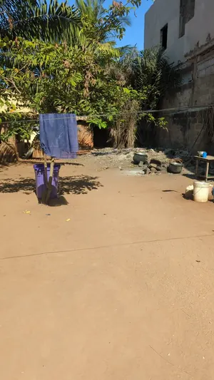 Vente d'un terrain à Nanégbé, demi-lot (30/10), 2 pièces, clôturé, proche du goudron – 19 millions FCFA à débattre — photo 4