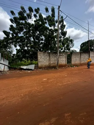 Terrain clôturé 1 lot (600 m²) avec titre foncier en vente à Agoè Fil'O PAC – 57 000 000 FCFA