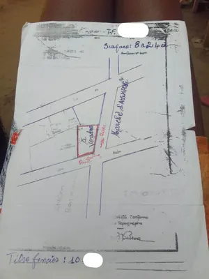 Terrain 824 m² en vente à Assigamé, angle de rue – 750 millions FCFA — photo 5
