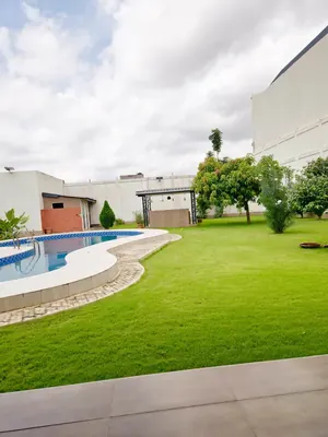 Vente d'une villa à Agoè Legbassito, 7 chambres, 1958 m², avec piscine et jardin, titre foncier personnel – 400 millions FCFA — photo 4