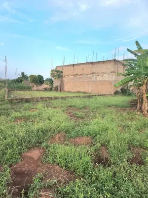 Terrain 1060 m² en vente à Apéssito derrière Station Sadko – 25 000 000 FCFA