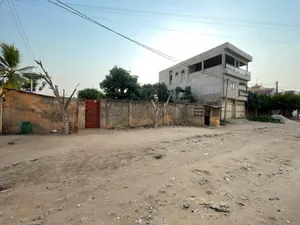 Terrain demi-lot avec constructions à vendre à Hédzranawoé Sagboville – 25 millions FCFA