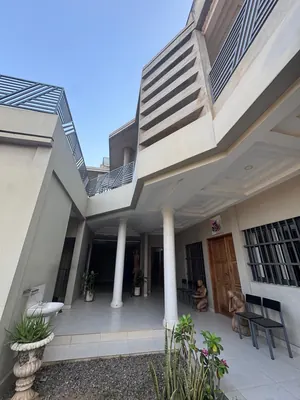 Villa duplex neuve 5 chambres en vente au bord du goudron à Attikoumé – 450 millions FCFA