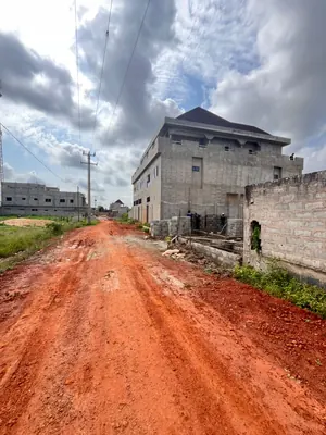 Terrain 1/4 de lot clôturé en vente à Agoè Nyivé – 12 000 000 FCFA