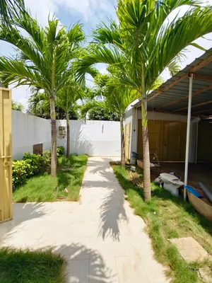Vente d'une villa à Agoè Zongo École Malaïka, R+1 avec dépendances, jardin, titre foncier personnel – 75 millions FCFA — photo 14