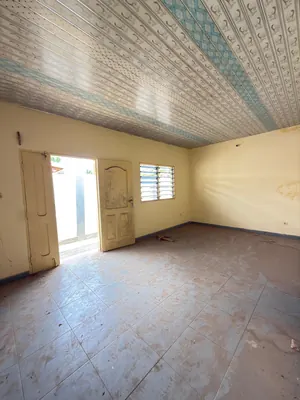 Vente d'une maison à Zanguera Dangbéssito, demi-lot 300 m², 3 appartements de 2 pièces, proche du goudron – 27 millions FCFA — photo 9