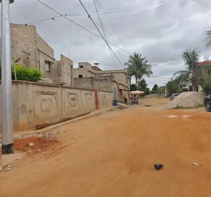 Vente d'un terrain à Nanégbé, 1 lot clôturé, à 100 m du carrefour Bonheur – 25 millions FCFA — photo 1