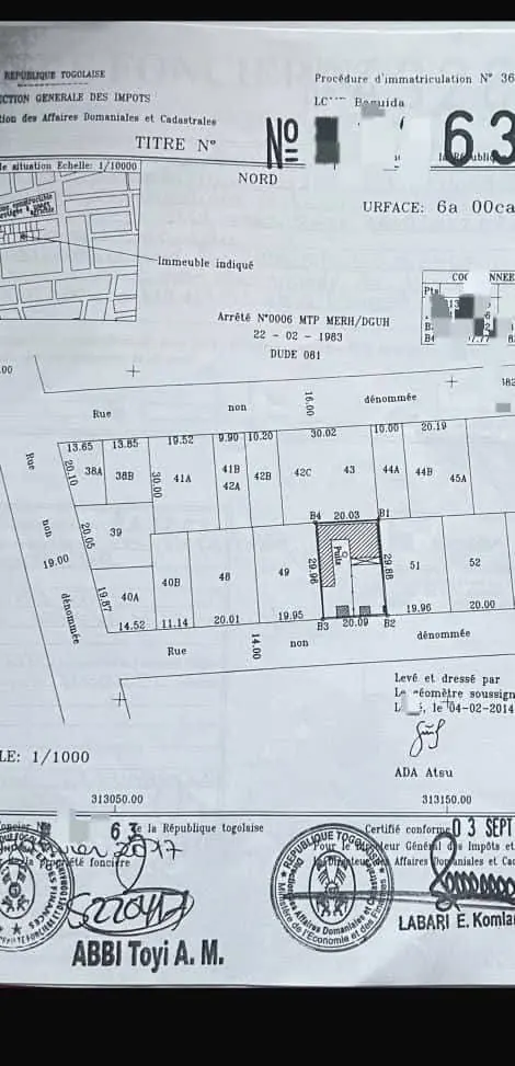 Vente d'un terrain à Baguida, 1 lot avec constructions, proche du goudron – 40 millions FCFA