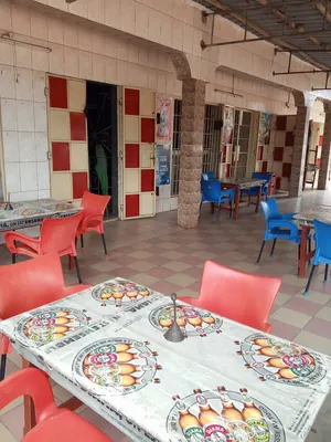 Terrain demi-lot avec 2 boutiques en vente au rond-point Limousine à Avedji – 45 millions FCFA — photo 2