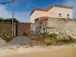 Terrain 1 lot à vendre à Baguida, proche du goudron – 50 millions FCFA — photo 1