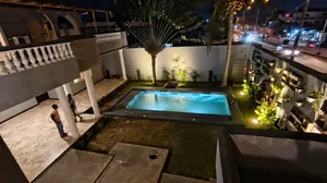 Villa 5 chambres à vendre à Tokoin Casablanca, 690 m² avec piscine et garage – 290 millions FCFA