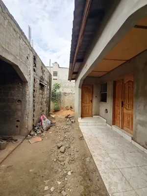 Vente d'une villa inachevée à Sogbossito Catholique, 4 chambres + 2 appartements, 1 lot 600 m², titre foncier – 90 millions FCFA — photo 14