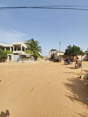 Vente de terrain à Legbassito Carrefour Zovadjin, 1,5 lots (900 m²), titre foncier personnel – prix à confirmer avec l'agence — photo 2