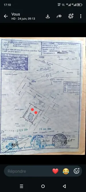 Vente d'un terrain à Agoè Assiyéyé Minamadou, 1 lot déduit, à moitié clôturé – 50 millions FCFA