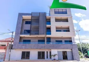 Immeuble commercial 23 chambres meublées à vendre à Lomégan – 600 m² – Titre foncier – 900 000 000 FCFA
