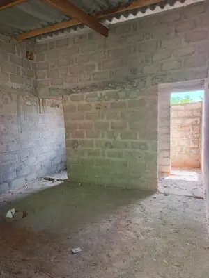 Maison inachevée 6 pièces en vente sur demi-lot à Aképédo avant péage – 14,5 millions FCFA — photo 3
