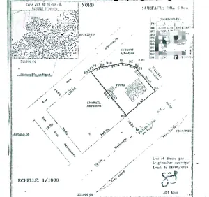 Terrain avec villa inachevée 3 chambres sur 2 lots en vente en bordure de goudron à Agbata – 90 millions FCFA