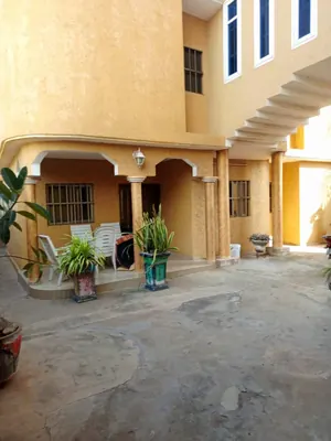 Vente d'une villa à Hountigomé, R+2, 10 chambres, 447 m², angle de rue – 250 millions FCFA — photo 14