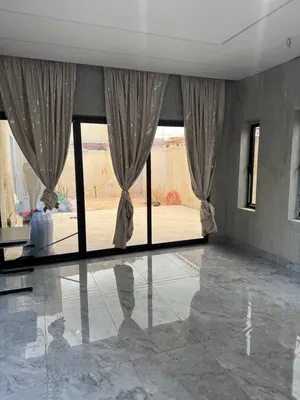 Vente d'une villa à Agoè Sogbossito, R+1, neuve, demi-lot, accès goudron – 55 millions FCFA — photo 2