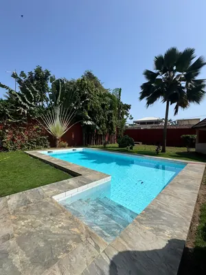 Location d'une villa à Tokoin Tako, 3 chambres + dépendance, avec piscine et jardin, à 50 m du goudron – 1 000 000 FCFA/mois — photo 6