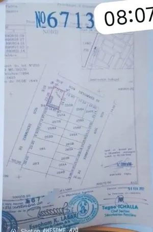 Vente d'un terrain à Agoè Carrefour Commando, demi-lot carré, angle de rue, bord de voie de 50m – 25 millions FCFA — photo 4