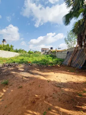 Terrain 500 m² en vente proche du goudron à Légbassito – 30 millions FCFA