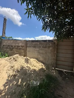 Terrain demi-lot clôturé en vente à Sanguera IPG – 15 millions FCFA — photo 2
