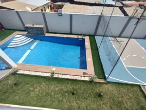 Villa triplex meublée 7 chambres à louer à Attiégou avec piscine et terrain de basketball – 1 700 000 FCFA/mois — photo 5