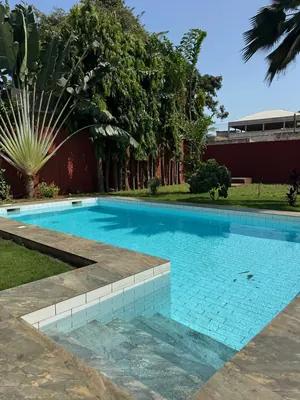 Location d'une villa à Tokoin Tako, 3 chambres + dépendance, avec piscine et jardin, à 50 m du goudron – 1 000 000 FCFA/mois — photo 7
