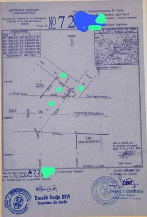 Terrain 1 lot en vente en angle de rue au bord du goudron à Agoè Legbassito Madjigbeto – 100 millions FCFA