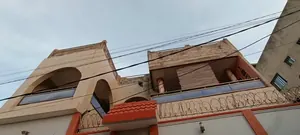 Vente d'une maison à Bè Kpehenou, 8 chambres, 5 boutiques, 453 m², en bordure de route principale – 140 millions FCFA — photo 1