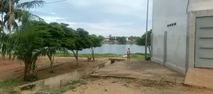 Terrain de 590 m² avec constructions en vente à Tokoin Super Taco, vue sur la lagune – 80 millions FCFA — photo 2