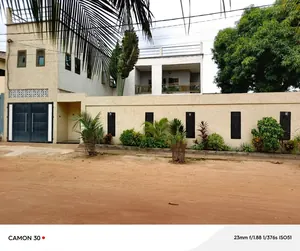 Terrain 6 450 m² en vente en bordure du goudron à Adétikopé PIA – prix à 50 millions FCFA le lot — photo 5
