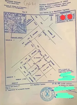 Terrain 1 lot de 600 m² clôturé à vendre à Agoè Légbassito près de la mairie – 27 millions FCFA