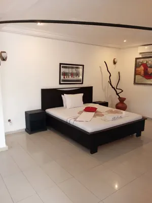 Résidence 17 chambres meublées avec piscine et sky bar en vente à Baguida Devego – Titre foncier – 450 000 000 FCFA — photo 5