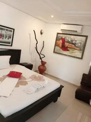 Résidence 17 chambres meublées avec piscine et sky bar en vente à Baguida Devego – Titre foncier – 450 000 000 FCFA — photo 7