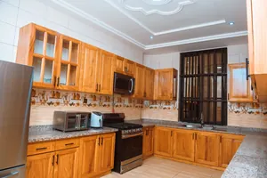 Vente d'une villa duplex meublée à Agodéké, 12 chambres, 600 m², titre foncier personnel – 250 millions FCFA — photo 28