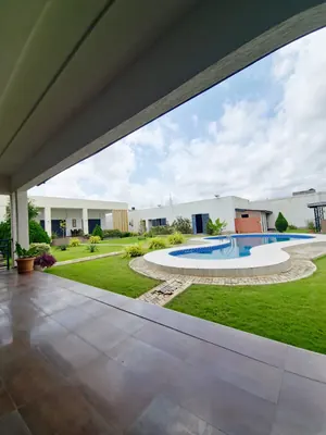 Vente d'une villa à Agoè Legbassito, 7 chambres, 1958 m², avec piscine et jardin, titre foncier personnel – 400 millions FCFA — photo 6