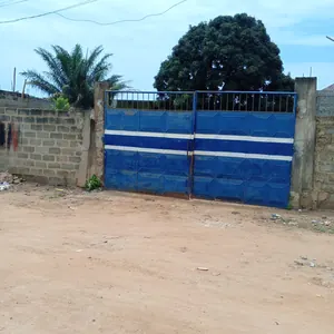 Vente de terrain à Agoè 2 Lions, 2 lots clôturés bien positionnés – 65 millions FCFA le lot — photo 1