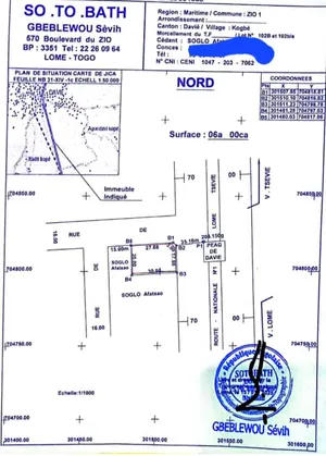 Terrain 1 lot en vente en angle de rue au bord du goudron Lomé-Cinkassé en face du péage de Davié – 12 millions FCFA