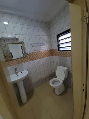 Location d'un appartement à Zanguera Assiko, rez-de-chaussée, chambre salon avec garage – 65 000 FCFA/mois — photo 8