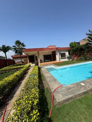 Location d'une villa à Tokoin Tako, 3 chambres + dépendance, avec piscine et jardin, à 50 m du goudron – 1 000 000 FCFA/mois — photo 3